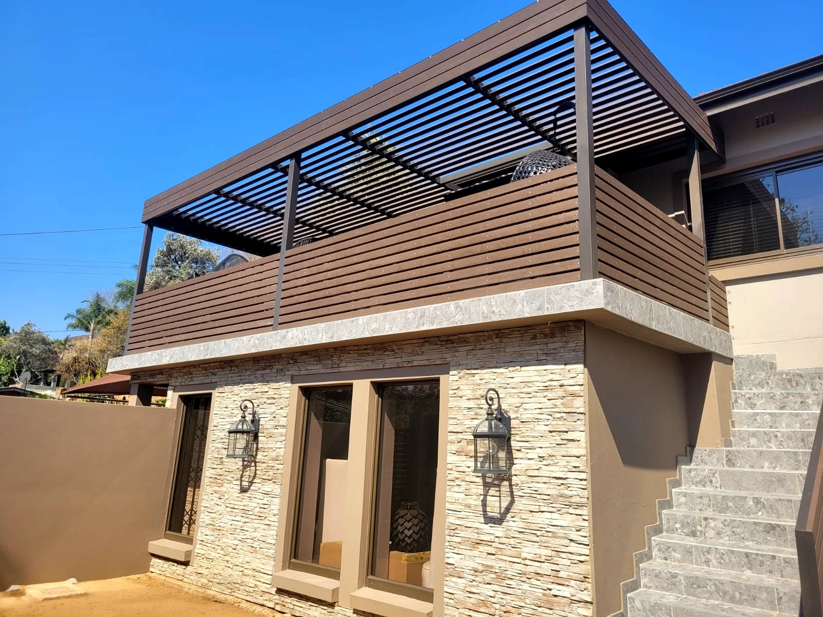 Balcony pergola exterior detail for a residential construction project